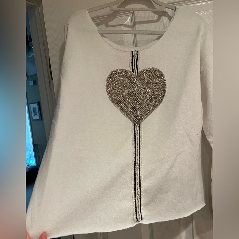 Elevated White Sweatshirt with Heart Design